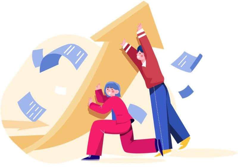 A man and a woman holding a giant arrow so it points upwards while papers fly around them